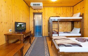 Фото номера Вилла с 3 спальнями Виллы Guest Houses Apriltsi г. Kravenik 36